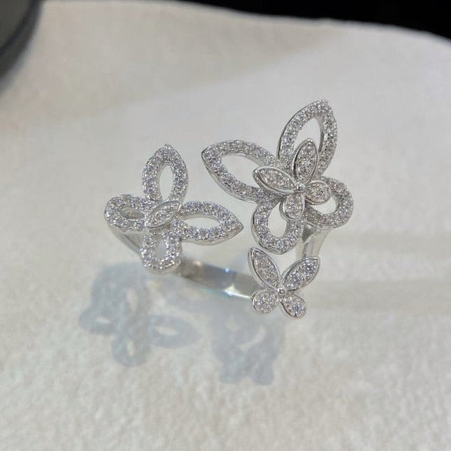 TRIPLE BUTTERFLY SILHOUETTE SILVER DIAMOND RING