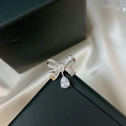 TILDAS BOW BAGUETTE CUT SILVER DIAMOND DROP RING