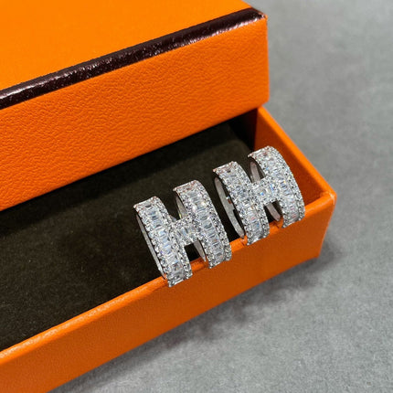 H STUD EARRINGS WITH SILVER DIAMONDS