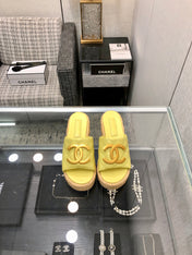 THICK SOLE WEDGE SLIPPERS IN SAND YELLOW LAMBSKIN AND BEIGE RUBBER