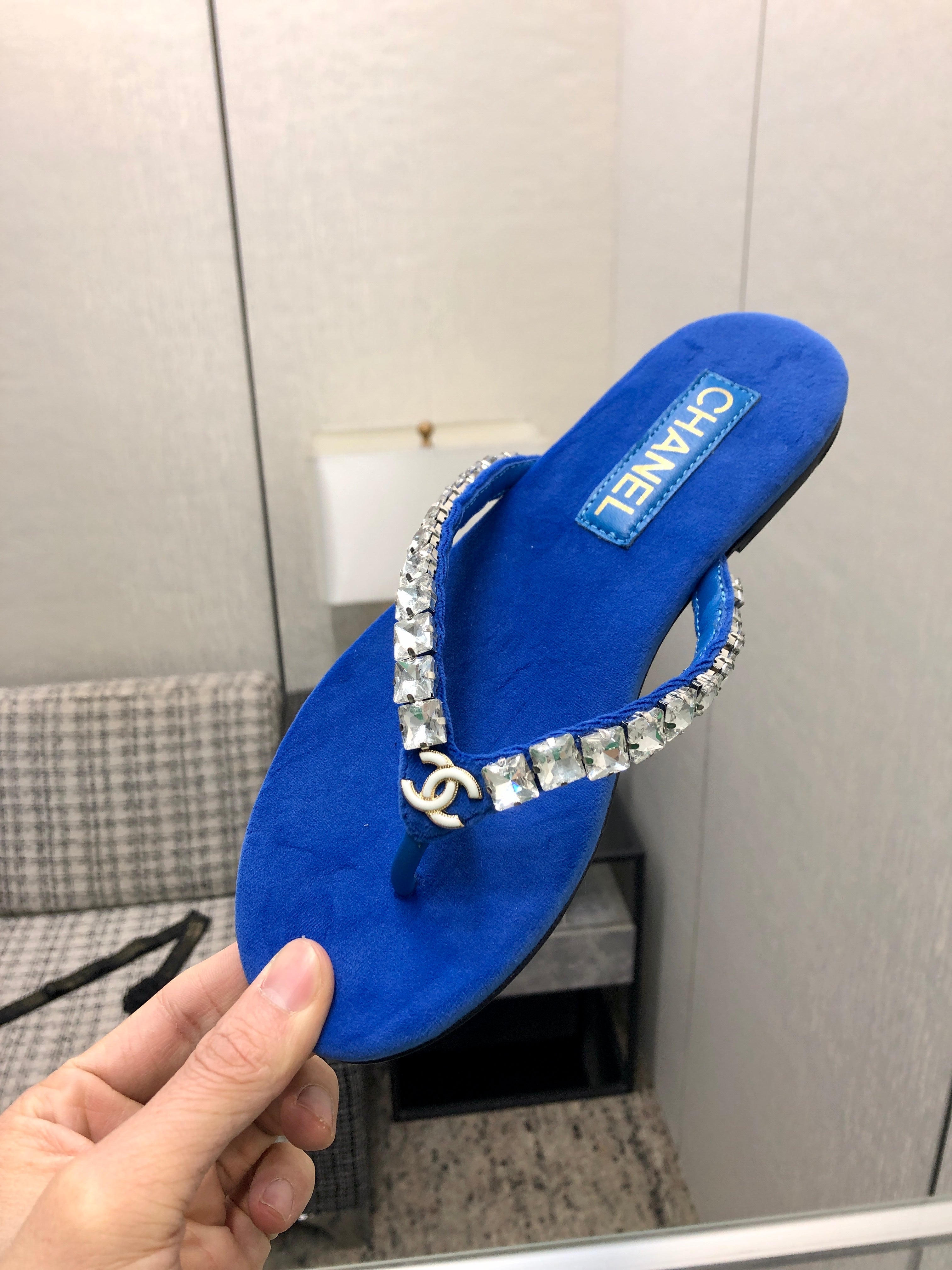 THONG SLIDE IN COBALT BLUE SUEDE WITH WHITE CRYSTALS