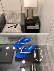 THONG SLIDE IN COBALT BLUE SUEDE WITH WHITE CRYSTALS