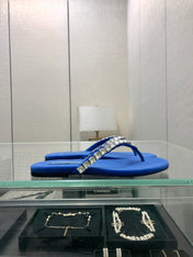 THONG SLIDE IN COBALT BLUE SUEDE WITH WHITE CRYSTALS