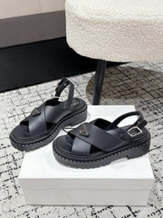 PRADA 25S CRISSCROSS SANDALS IN BLACK CALFSKIN LOGO