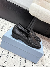 PRADA 26S LOAFERS 25MM IN BLACK CALFSKIN