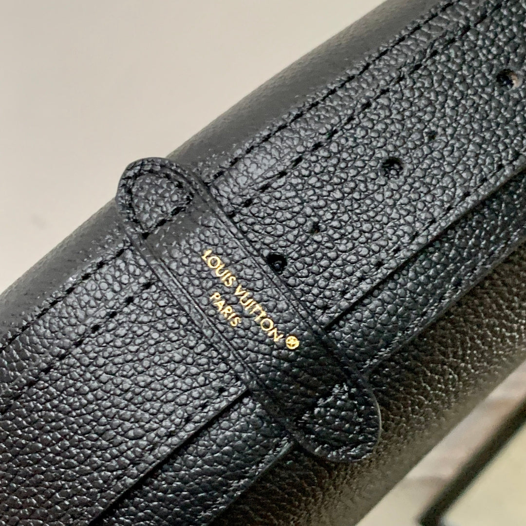 LOW KEY COOKIE MM 32 IN BLACK CALFSKIN BROWN MONOGRAM TAG