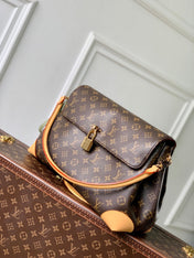 HIDE AWAY MM 36 IN BROWN MONOGRAM COATED CANVAS AND CALFSKIN