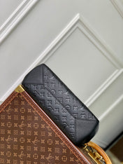 ANYTIME PM 34 IN BLACK MONOGRAM EMPREINTE CALFSKIN