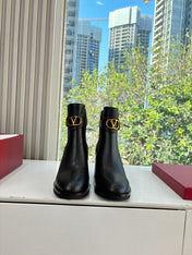 VALENTINO 25S SIGNATURE LOGO BOOTS 60 MM IN BLACK CALFSKIN WITH GOLD HARDWARE