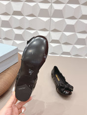 PRADA 26S ROUND TOE FLATS WITH BOW IN BLACK PATENT CALFSKIN