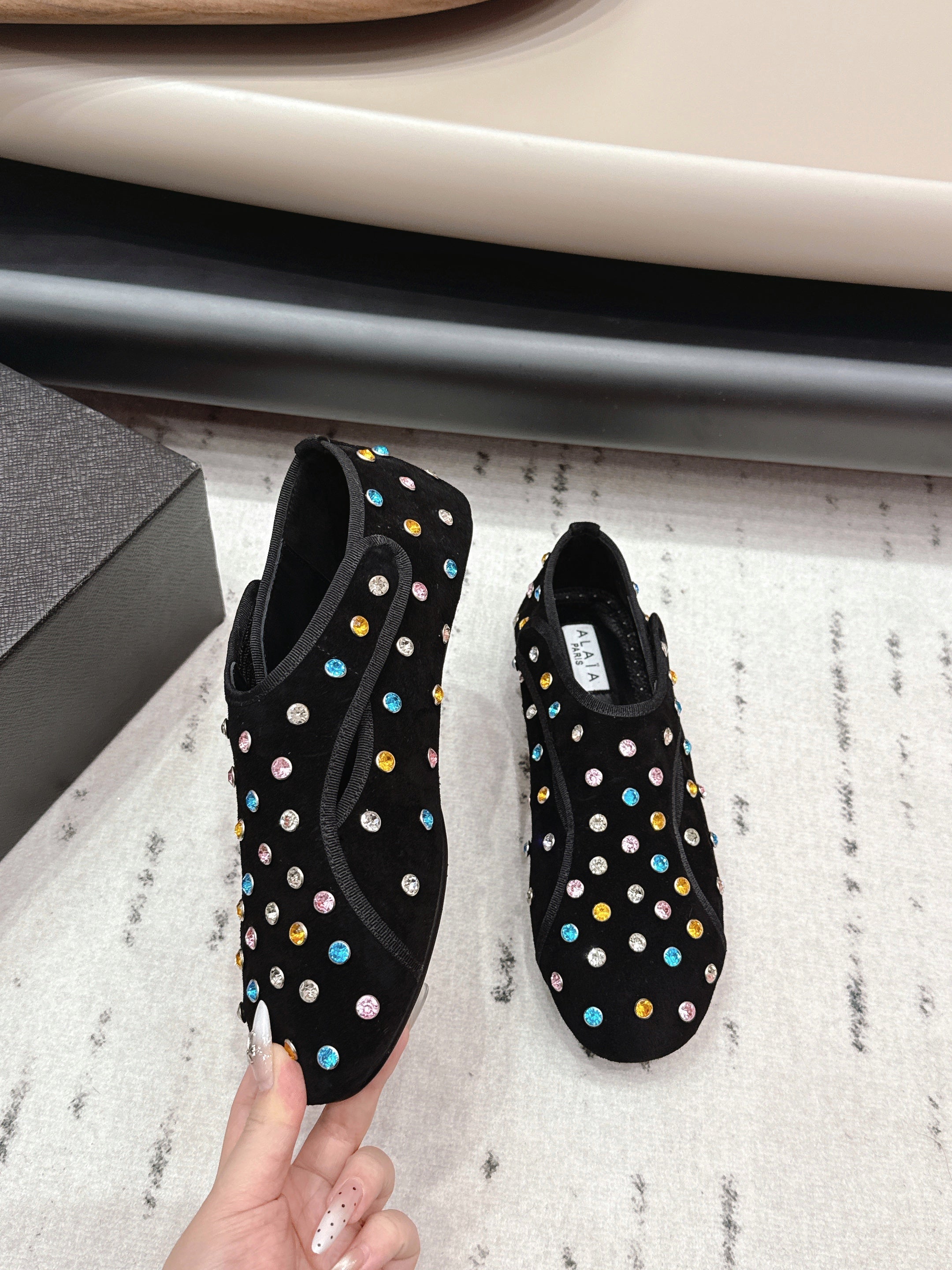 ALAIA 26S EMBELLISHED FLATS IN BLACK SUEDE