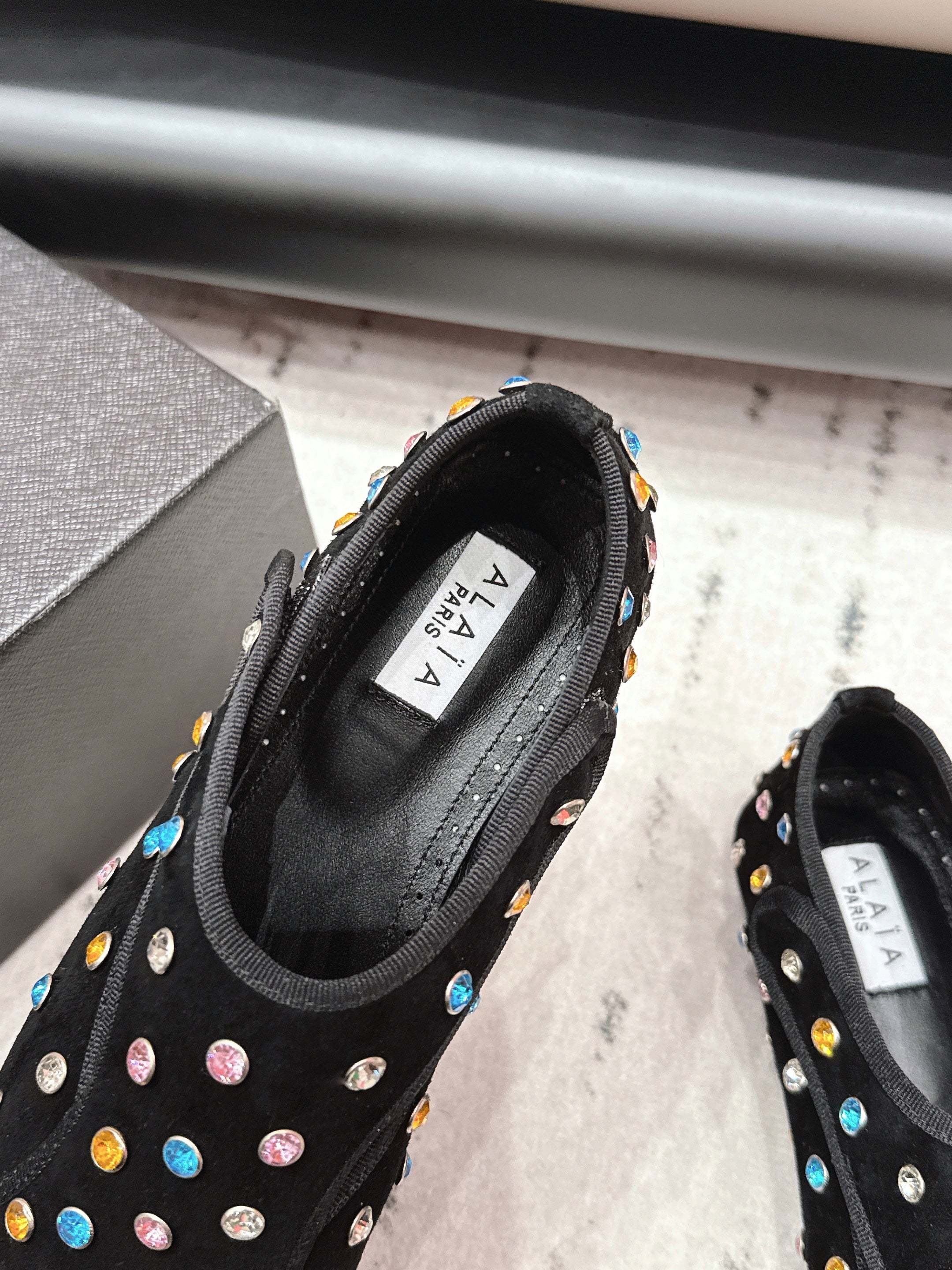 ALAIA 26S EMBELLISHED FLATS IN BLACK SUEDE