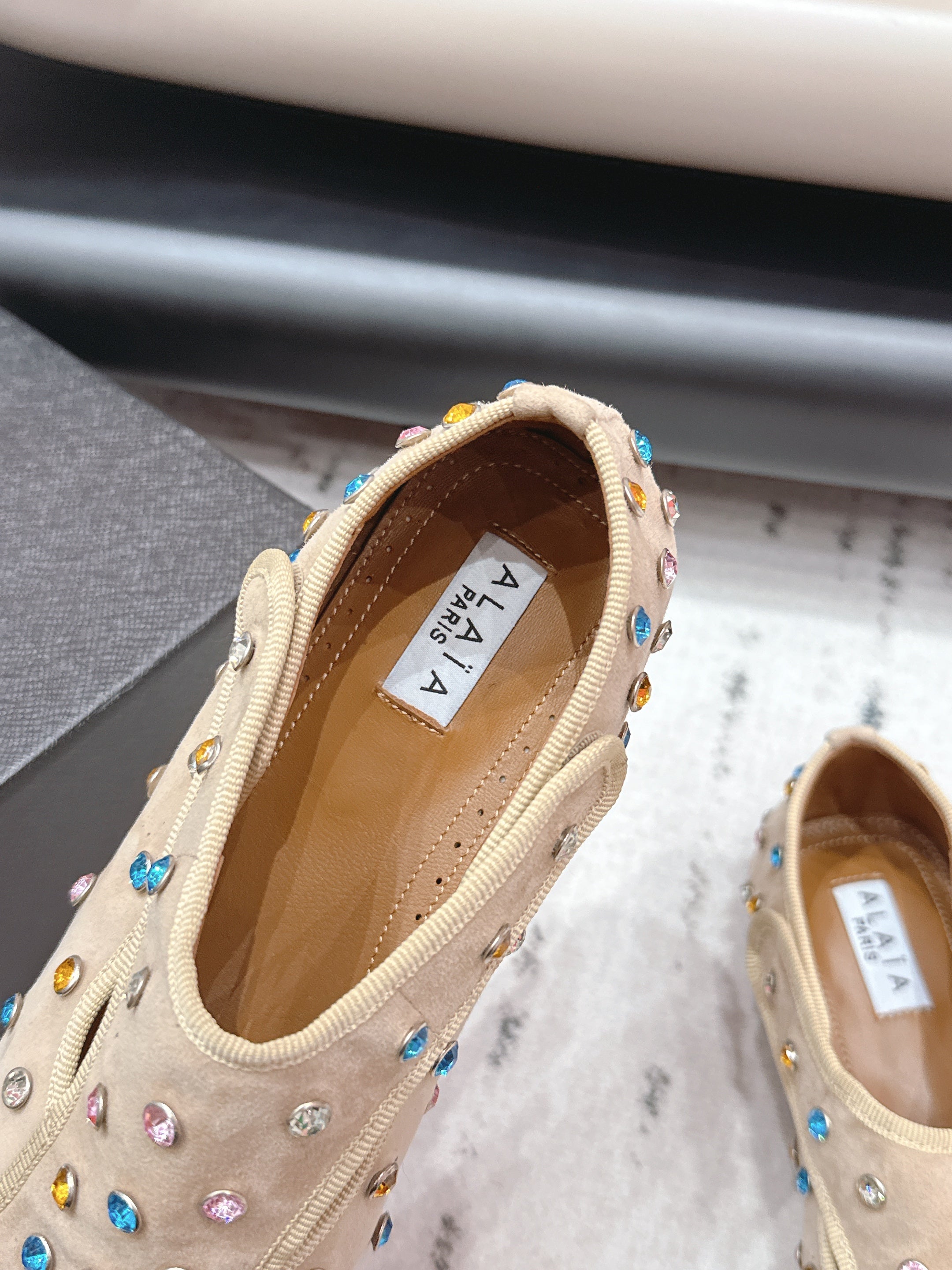 ALAIA 26S EMBELLISHED FLATS IN BEIGE SUEDE