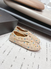 ALAIA 26S EMBELLISHED FLATS IN BEIGE SUEDE