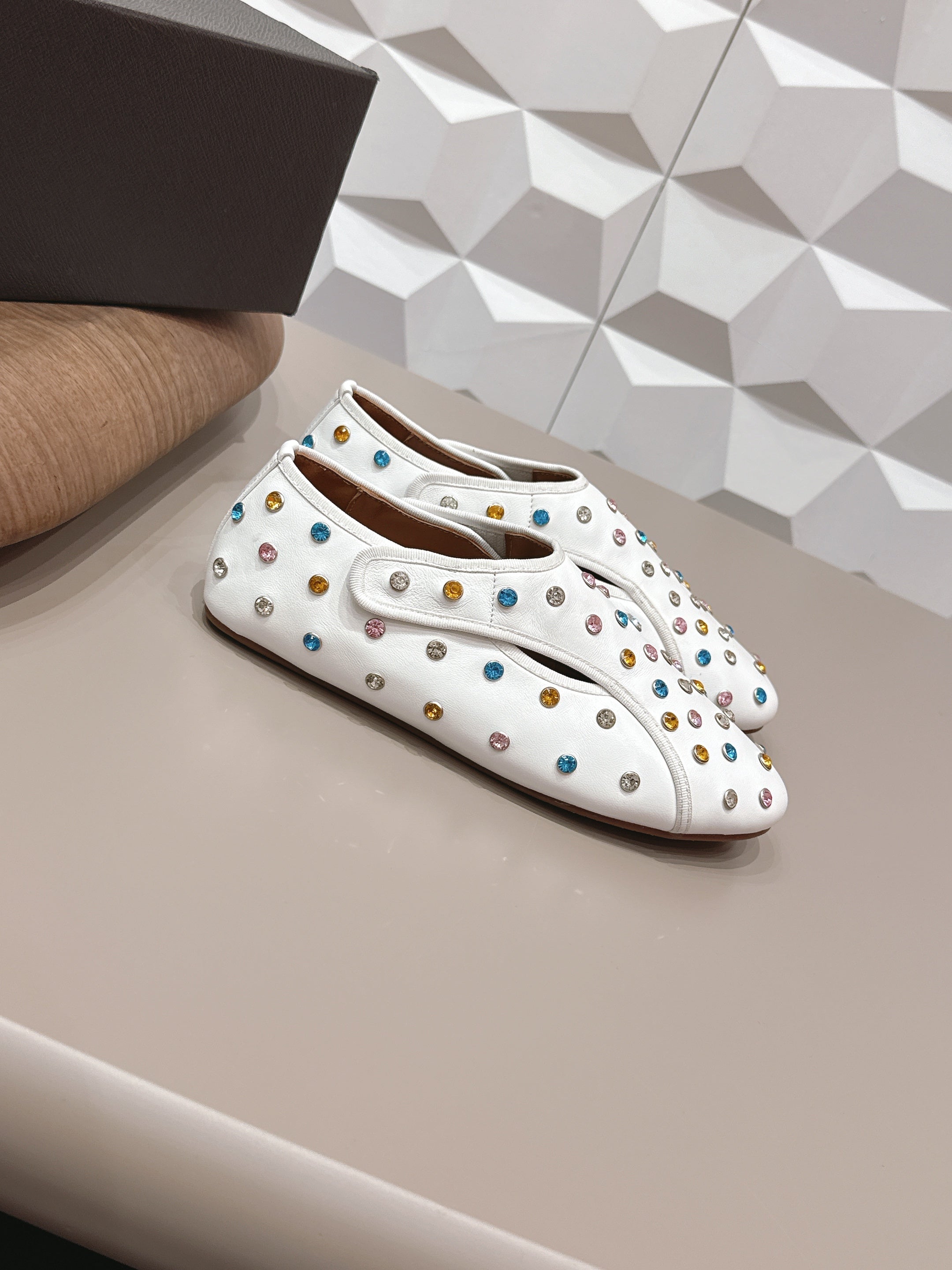 ALAIA 26S EMBELLISHED FLATS IN WHITE LAMBSKIN