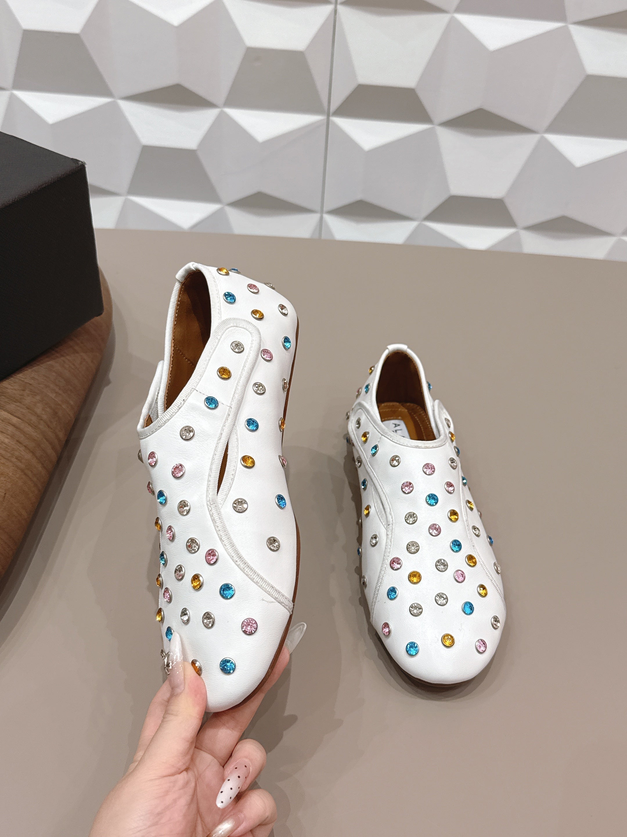 ALAIA 26S EMBELLISHED FLATS IN WHITE LAMBSKIN