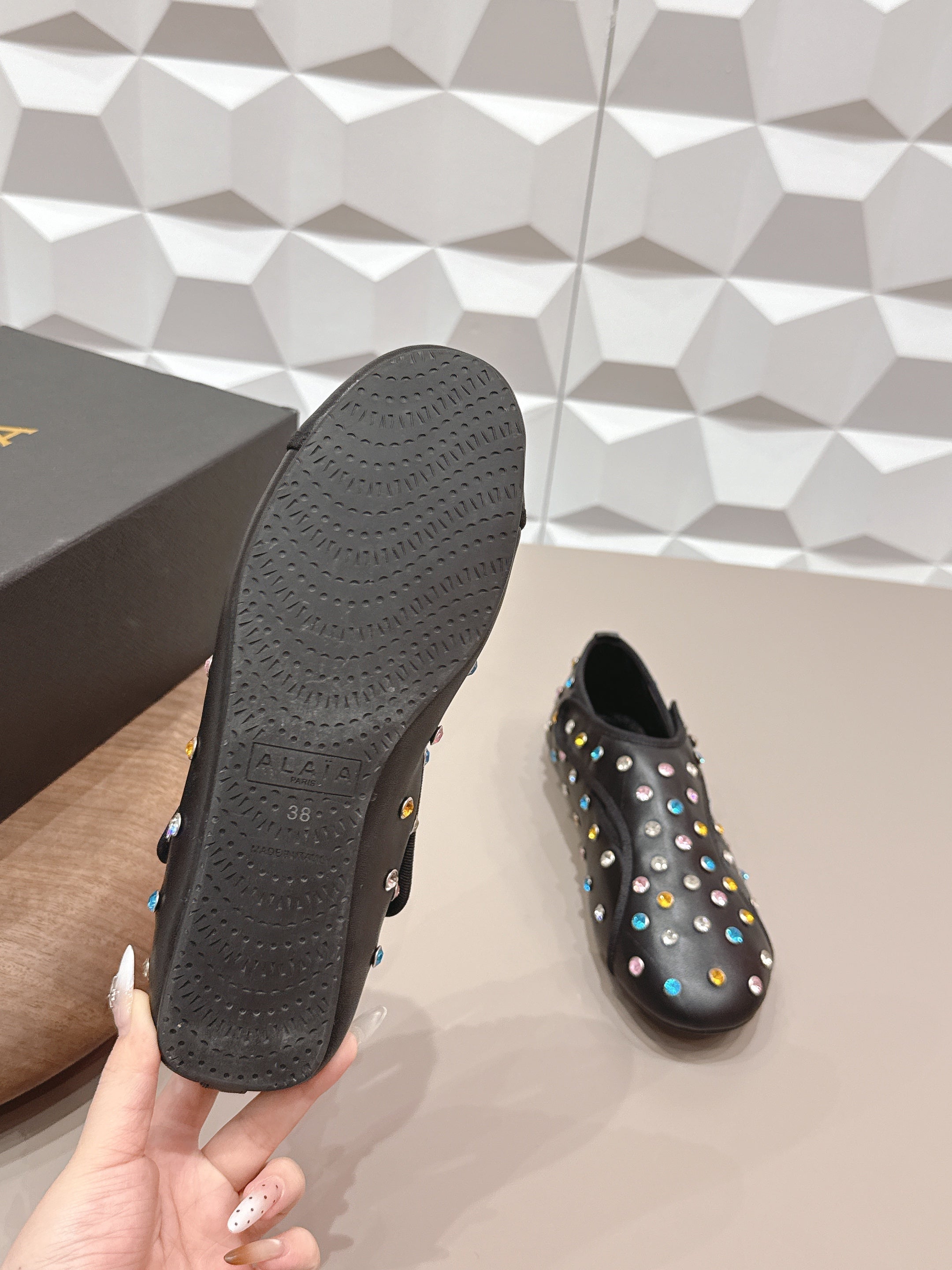 ALAIA 26S EMBELLISHED FLATS IN BLACK LAMBSKIN