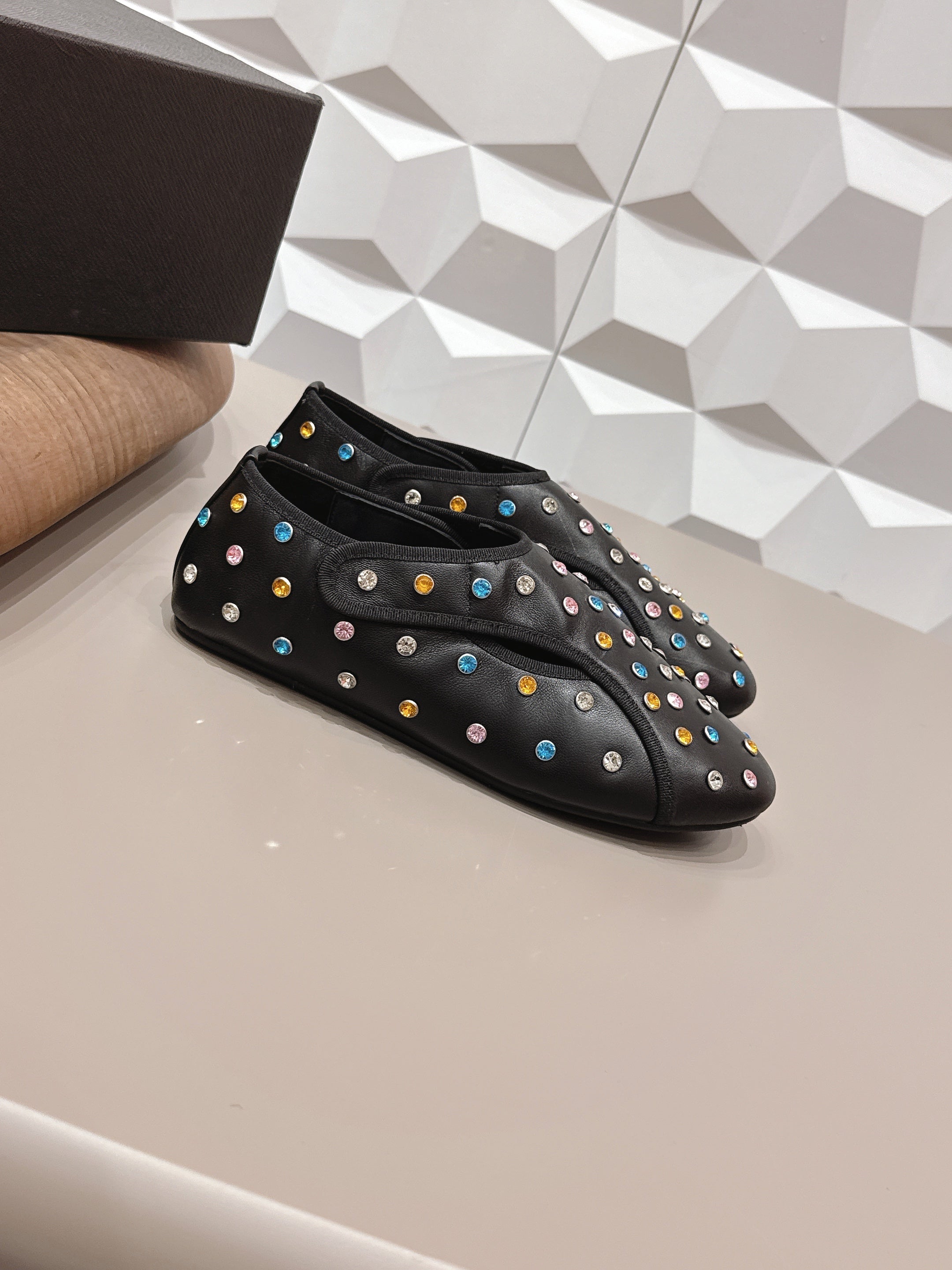 ALAIA 26S EMBELLISHED FLATS IN BLACK LAMBSKIN