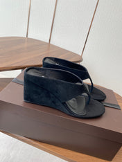 ALAIA WEDGE THONG SANDALS 25S IN BLACK SUEDE