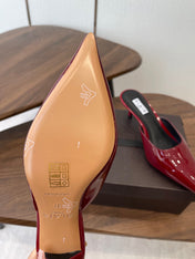 ALAIA 26S HEELED MULES 50 MM IN DARK RED GLOSSY CALFSKIN