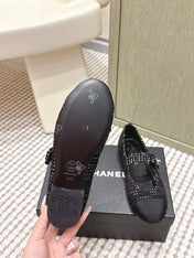 CHANEL 25S MARY JANE FLAT IN BLACK TWEED WITH CAP TOE GOLD HARDWARE