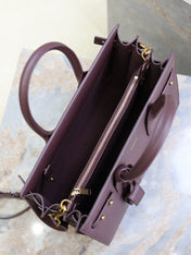 YSL 25S SAC DE JOUR GM 32 IN ROUGE CABERNET SUPPLE GRAINED CALFSKIN