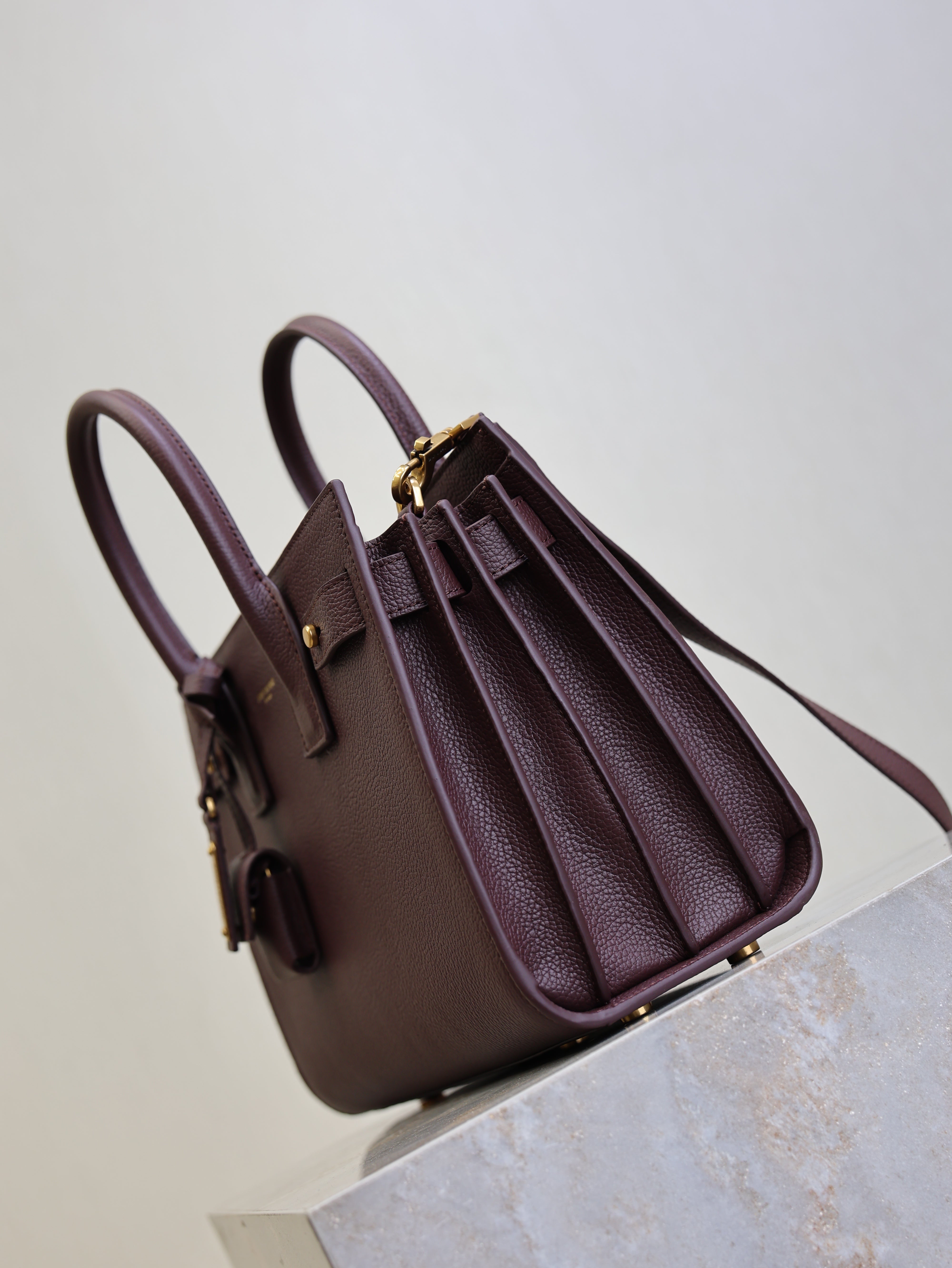 YSL 25S SAC DE JOUR MM 26 IN ROUGE CABERNET SUPPLE GRAINED CALFSKIN