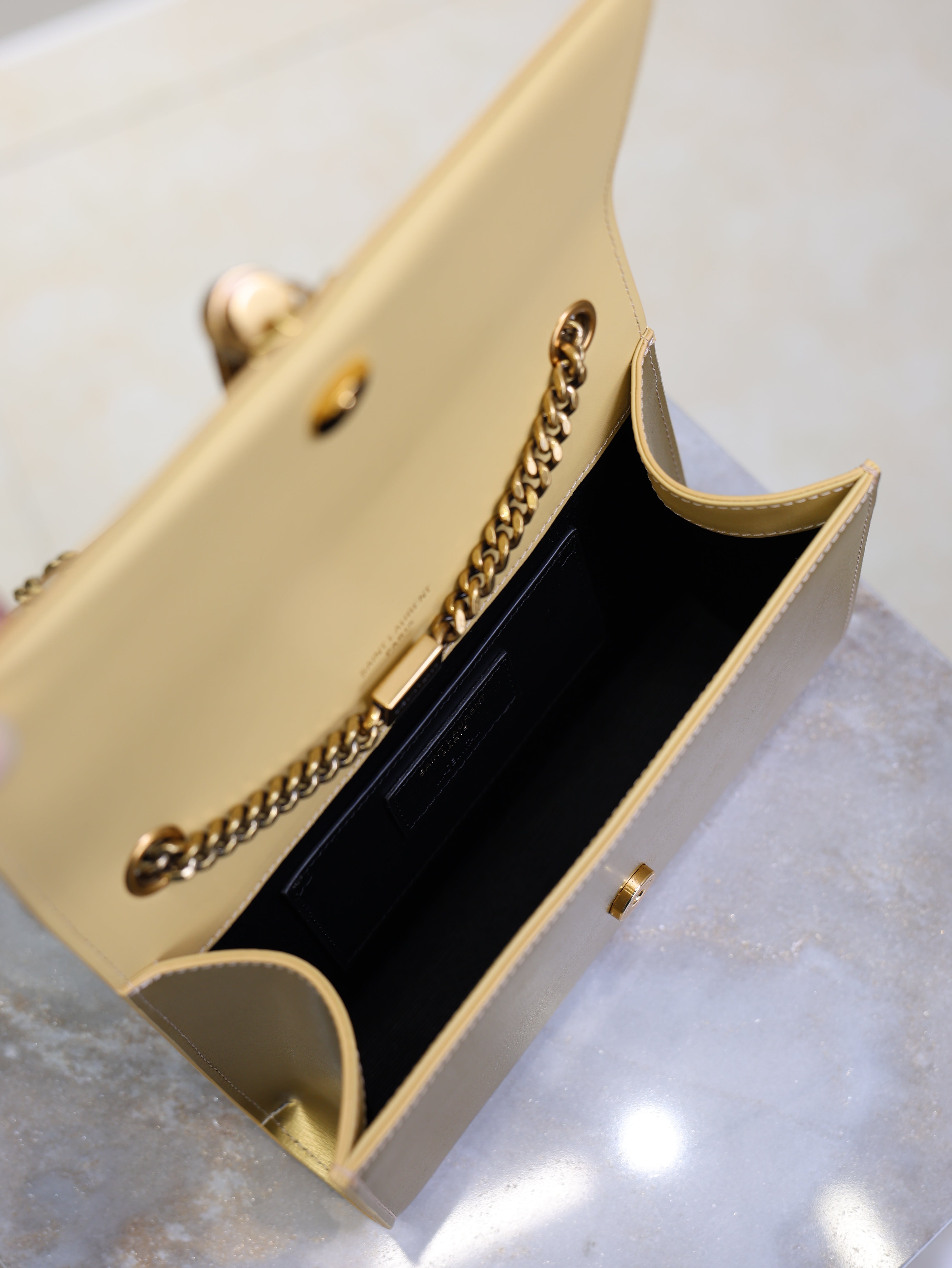 YSL 25S KATE TASSEL 20 IN GOLD METALLIC CALFSKIN GOLD HARDWARE