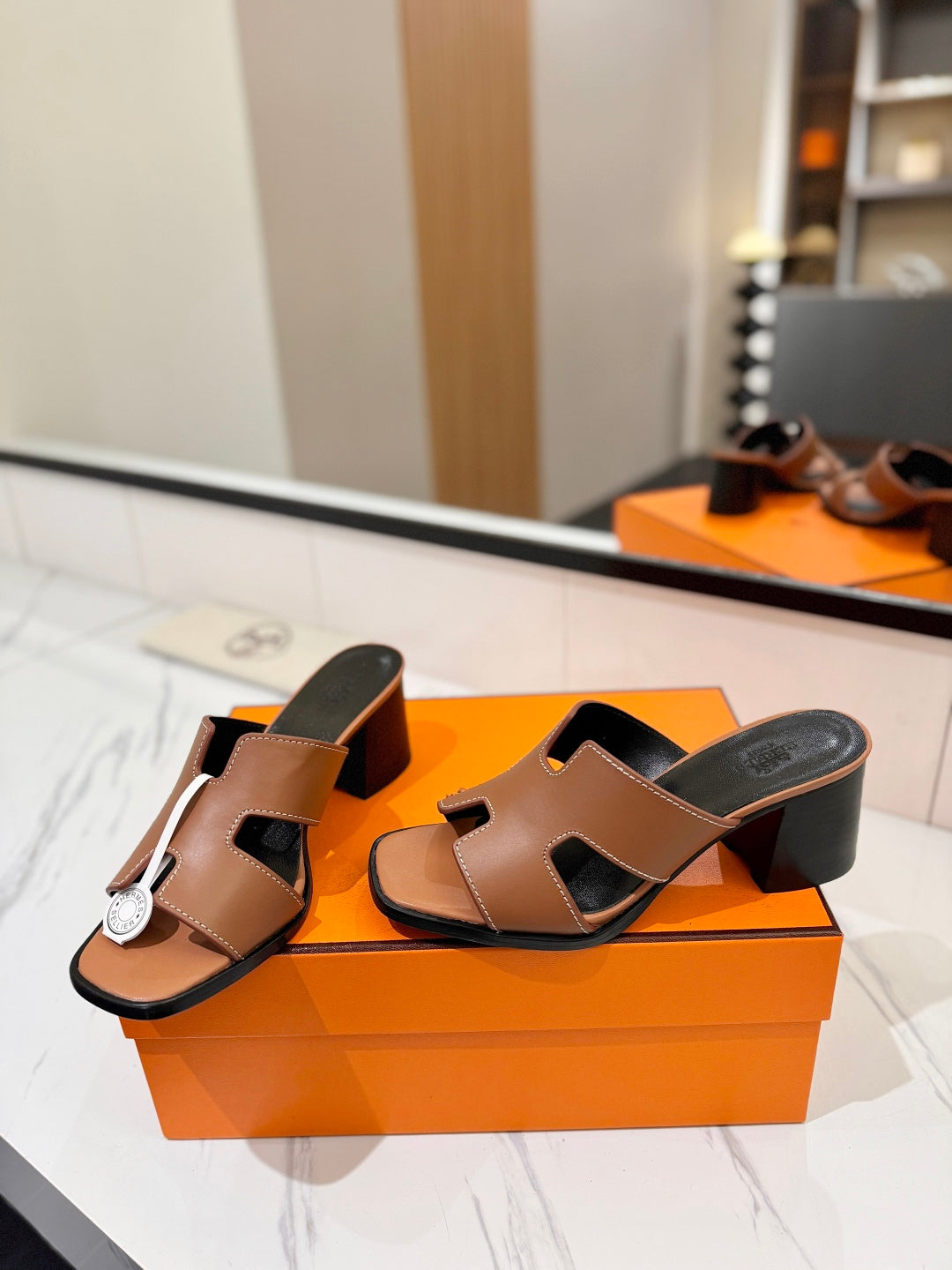 HM 26S HELIA SANDAL 70MM IN BROWN AND BLACK CALFSKIN