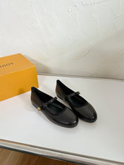 ROMY FLAT BALLERINA IN BLACK CALFSKIN