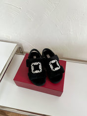 SLIDY VIV' WINTER FUR STRASS BUCKLE SANDALS IN BLACK SHEARLING