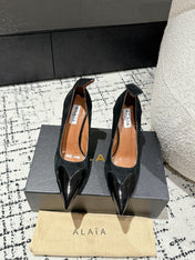 ALAIA HIGH PUMPS 10CM IN BLACK SUEDE MIX CALFSKIN