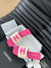 WOVEN SLIDE IN RAFFIA AND BRIGHT PINK LAMBSKIN