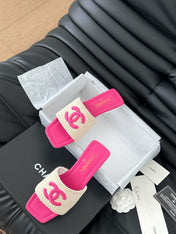 WOVEN SLIDE IN RAFFIA AND BRIGHT PINK LAMBSKIN