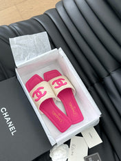 WOVEN SLIDE IN RAFFIA AND BRIGHT PINK LAMBSKIN