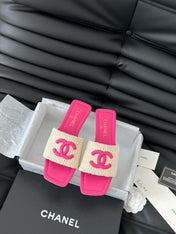 WOVEN SLIDE IN RAFFIA AND BRIGHT PINK LAMBSKIN