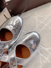 ALAIA CRISS CROSS BALLET FLAT IN SILVER LAMBSKIN