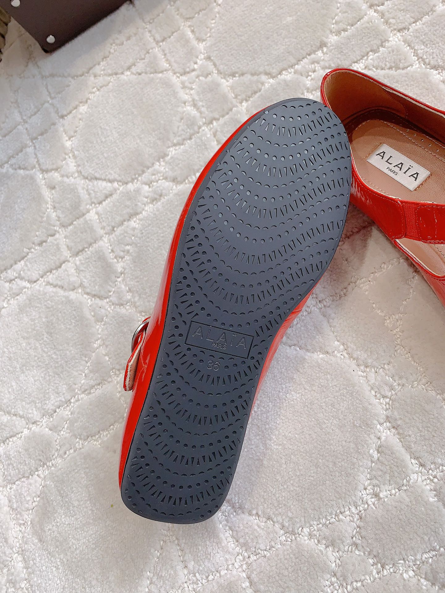 ALAIA CRISS CROSS BALLET FLAT IN CANDY RED LAMBSKIN WITH SILVER HARDWARE