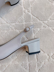 SLINGBACKS IN SLATE GREY MIX BLACK SHEEPSKIN