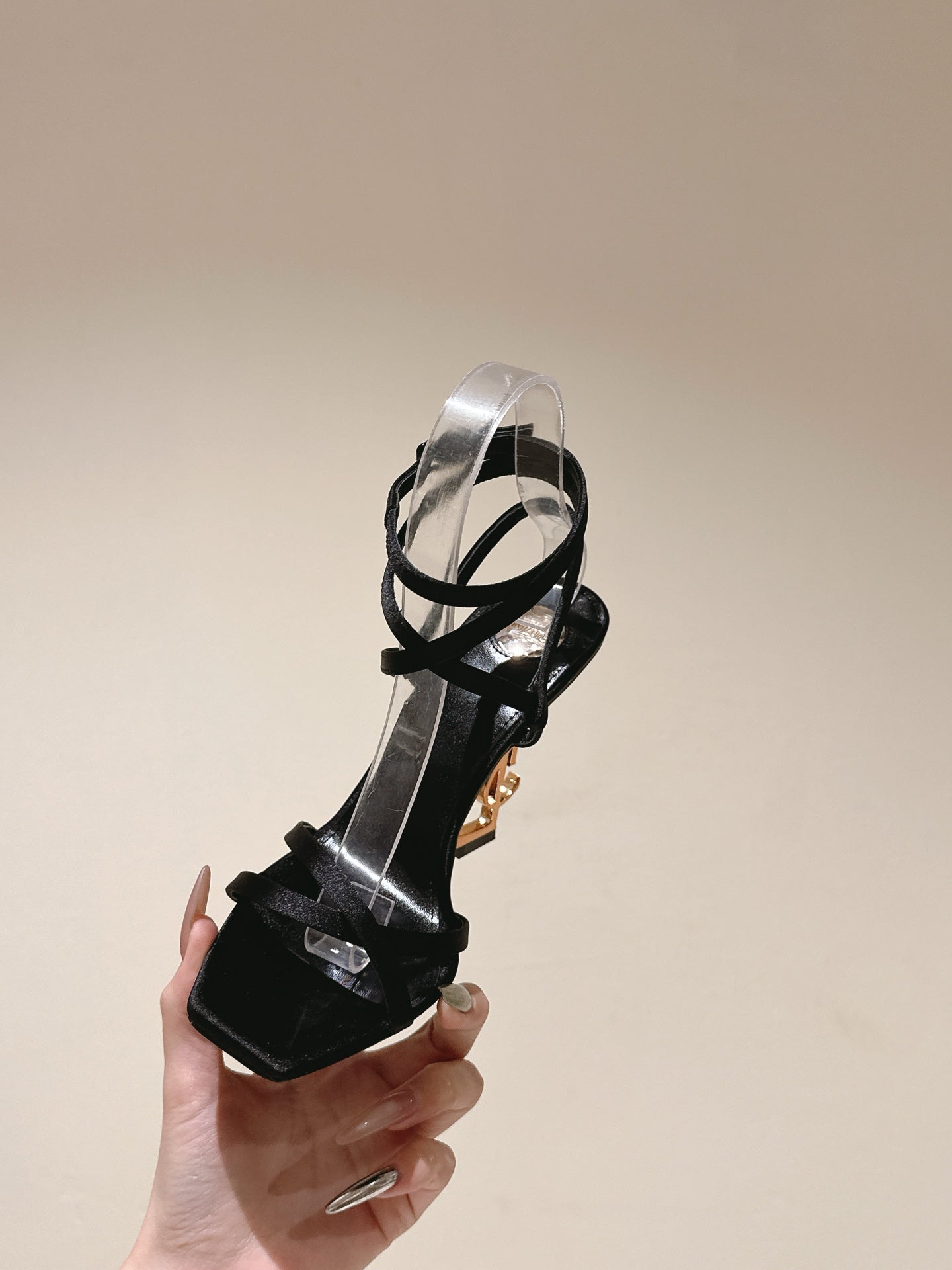 YSL 25S HIGH-HEEL SANDALS 100 MM IN BLACK SATIN WITH YSL LOGO HEEL DESIGN IN GOLD