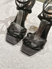 YSL 25S HIGH-HEEL SANDALS 100 MM IN BLACK SATIN WITH YSL LOGO HEEL DESIGN IN GOLD