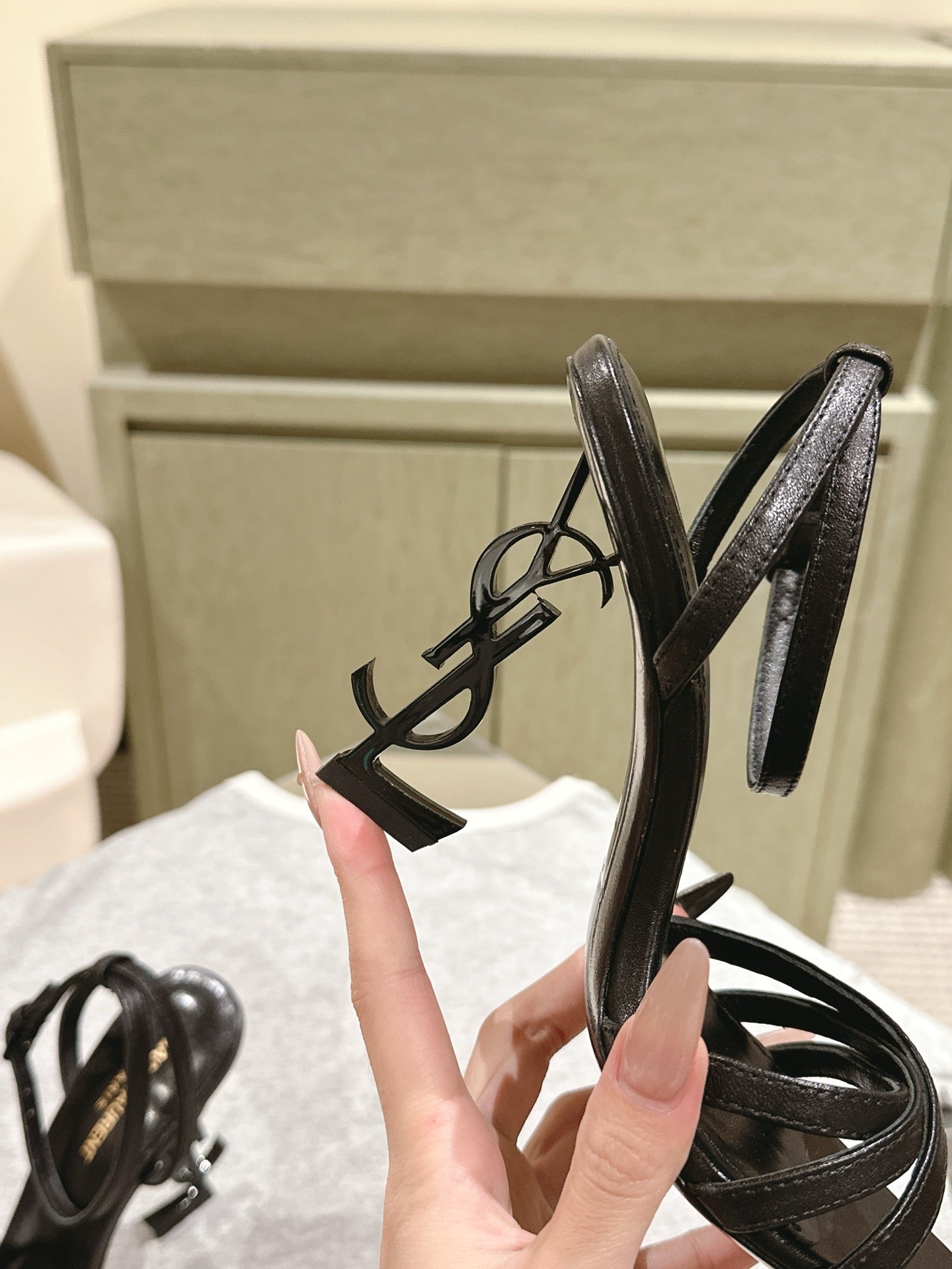 YSL 25S HIGH-HEEL SANDALS 100 MM IN BLACK LAMBSKIN WITH YSL LOGO HEEL DESIGN