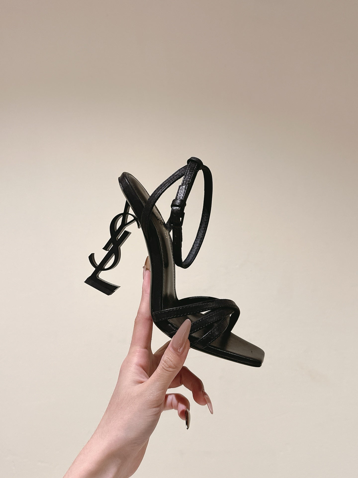 YSL 25S HIGH-HEEL SANDALS 100 MM IN BLACK LAMBSKIN WITH YSL LOGO HEEL DESIGN