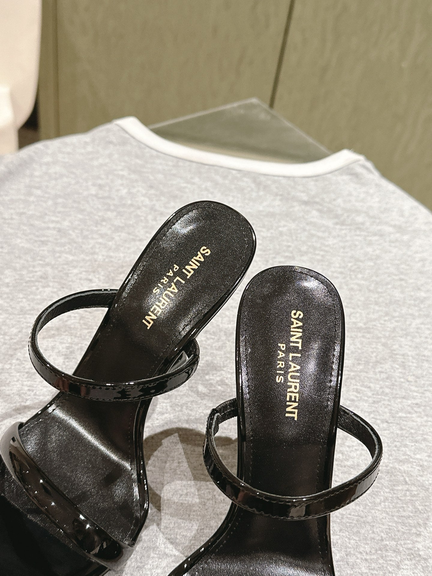 YSL 25S OPYUM HIGH-HEEL SANDALS 100 MM IN BLACK LAMBSKIN