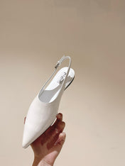 ALAIA SLINGBACK 25S IN WHITE PATENT LEATHER