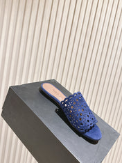 ALAIA PERFORATED SLIDE SANDALS 25S IN NAVY BLUE SUEDE