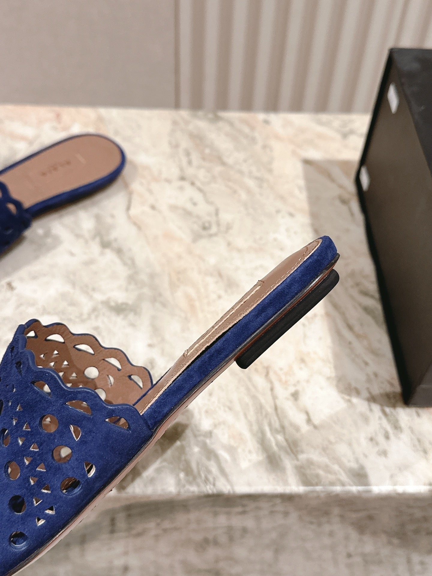 ALAIA PERFORATED SLIDE SANDALS 25S IN NAVY BLUE SUEDE