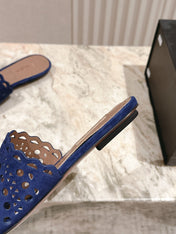 ALAIA PERFORATED SLIDE SANDALS 25S IN NAVY BLUE SUEDE