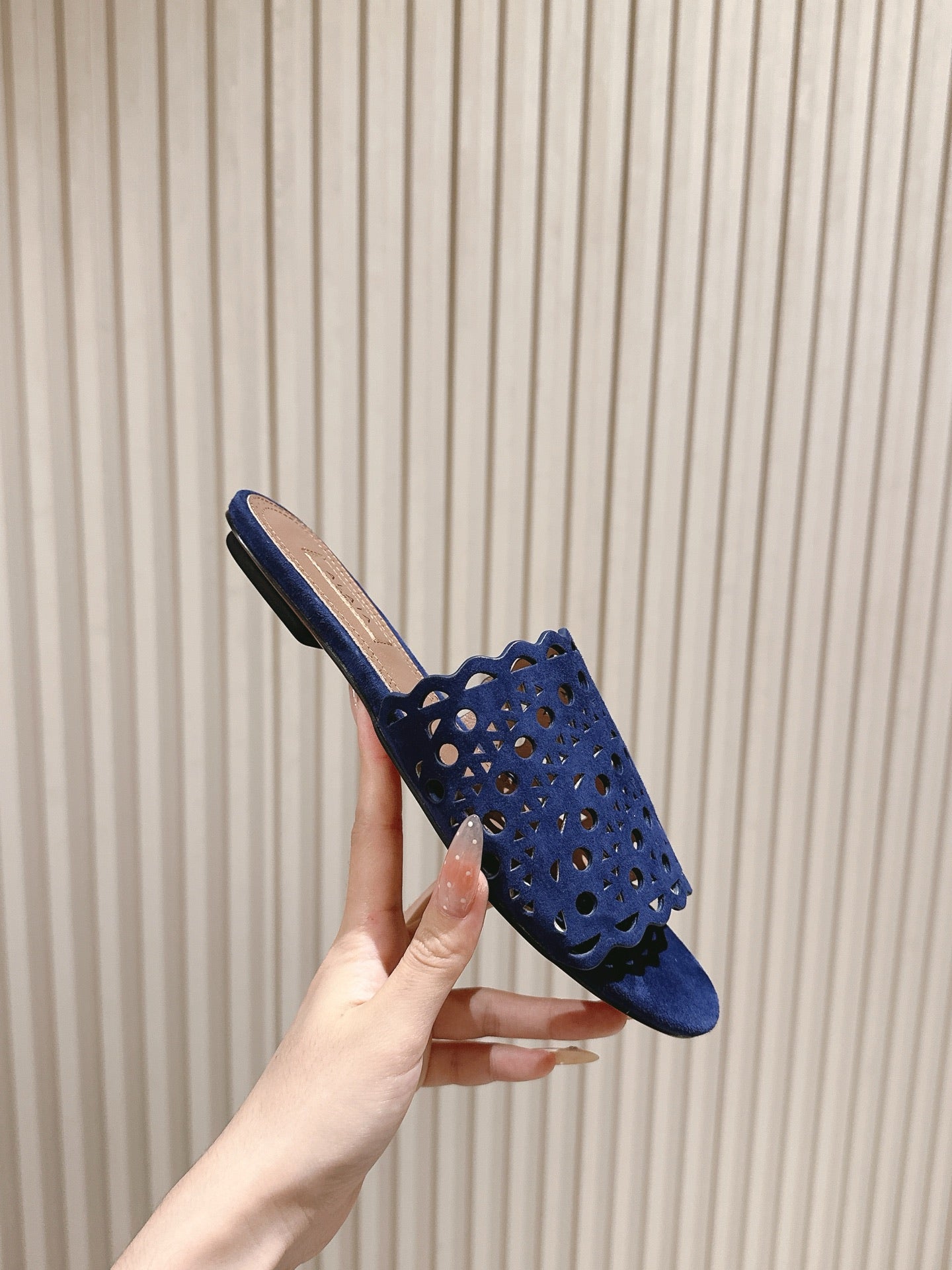 ALAIA PERFORATED SLIDE SANDALS 25S IN NAVY BLUE SUEDE
