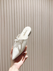 CC FLAT MULES 25S IN WHITE PATENT LEATHER
